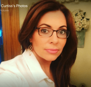 Alayne Curtis is a Capitol region hair dresser who took NXIVM courses.