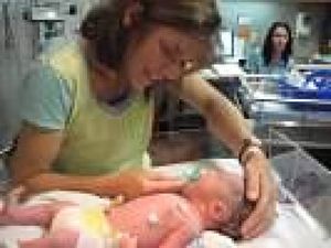Karen with Sawyer. He was adopted and she was there when Sawyer was born in Utah. Karen remained with the prematurely born baby until he was released fomr the new born intensive care unit. Because of Karen's experience as an adoptive mother and special needs children, Swayer was released to Karen when he was 11 days old. She raised him every day of her life, while her husband worked away from home. Swayer was removed from his mother's home when he was nine and placed in the home of his father, who the  boy claims sexually abuses him.