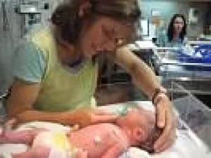 Karen with Sawyer. He was adopted and she was there when Sawyer was born in Utah. Karen remained with the prematurely born baby until he was released fomr the new born intensive care unit. Because of Karen's experience as an adoptive mother and special needs children, Swayer was released to Karen when he was 11 days old. She raised him every day of her life, while her husband worked away from home. Swayer was removed from his mother's home when he was nine and placed in the home of his father, who the  boy claims sexually abuses him.