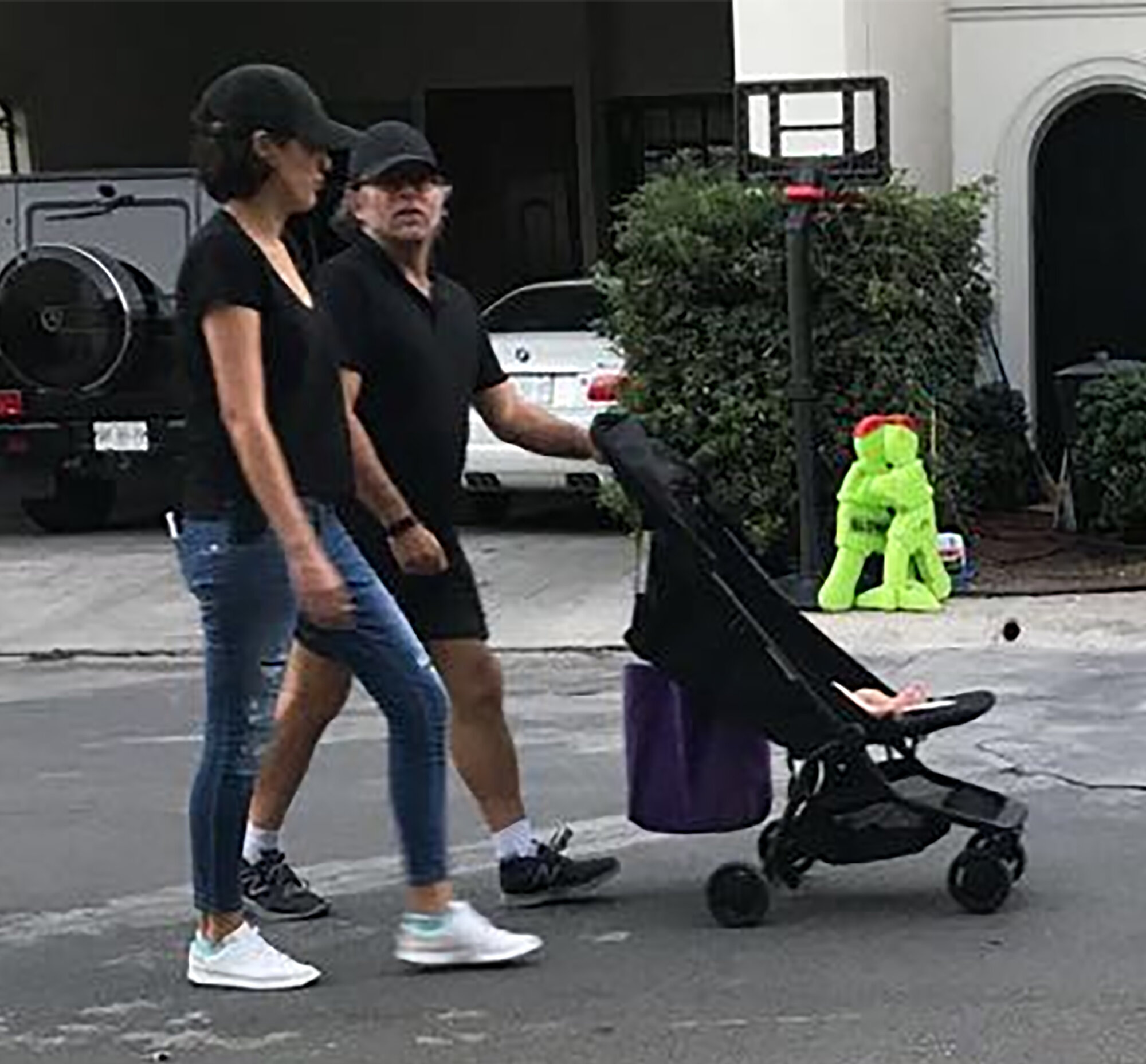 Frank Report Caption Contest for Photo of Raniere & Girlfriend & Child