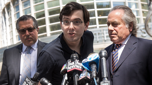Marc Agnifilo [l], Martin Shkreli [c], and Benjamin Brafman [r]