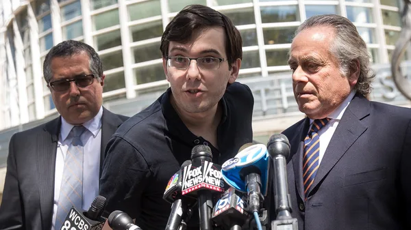 Marc Agnifilo [l], Martin Shkreli [c], and Benjamin Brafman [r]