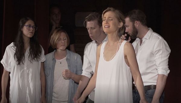 Allison Mack performs with the a capella singing group Simply Human.