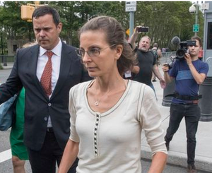 John Sandweg walks with his client Clare Bronfman