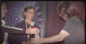 NXIVM-American-Greed-Sara-Bronfman-Clare-Bronfman-Present-Check-to-Keith-Raniere