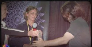 NXIVM-American-Greed-Sara-Bronfman-Clare-Bronfman-Present-Check-to-Keith-Raniere