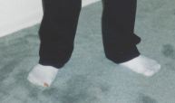 Keith Raniere's feet.