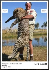 Jimmy John (right) embraces a Delta Leopard he apparently killed in 2010. 