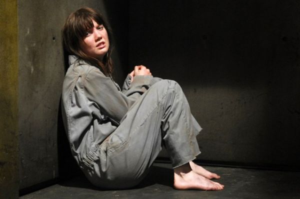 The media loves to publish this photo of Nicki Clyne to show how she is a captured and brainwashed slave.  Actually it is a photograph of her from an episode of Battlestar Galactica, where she was captured and made a slave.