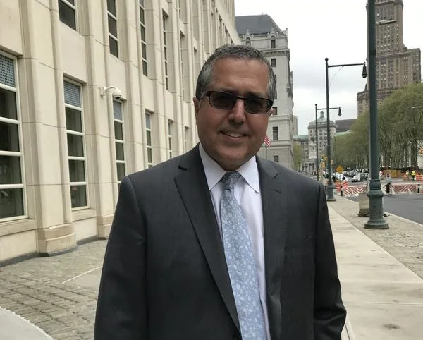 Keith Ranieres super lawyer, Marc Agnifilo, outside the Brooklyn courtroom Monday. [Photo by Dianne Lipson]