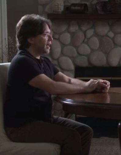 “Tubby” Raniere uses hands to make his points on all levels —