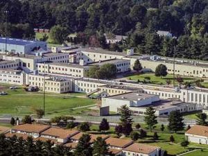 FILE - An aerial view captures the Danbury Connecticut Federal Correctional Institute Sept. 24, 2004. Two U.S. senators Chris Murphy and Richard Blumenthal said Wednesday, Jan. 26, 2022, they were denied access to major parts of the prison while trying to examine conditions there. (AP Photo/Douglas Healey, File)
