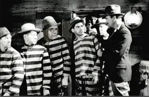 Warden [right] talks to students on the stripe path.