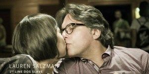 Keith Raniere gives his trademark on the lips kiss to Lauren Salzman.