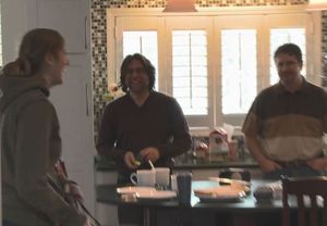 Raniere with devotees at what looks like Nancy Salzman's house.