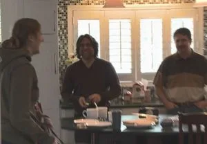 Raniere with devotees at what looks like Nancy Salzman's house.