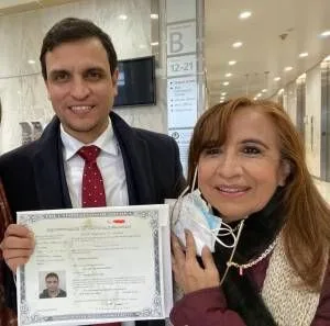 Eduardo with his mother - on the day of his naturalization as a US citizen.