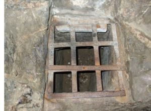 An oubliette or dungeon.
