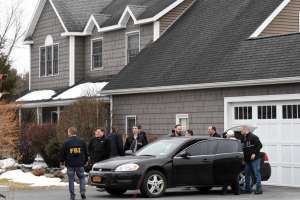 Here is a picture of the FBI raiding Nancy's house, the day after Raniere was arrested and the day they found more than $500,000 in cash stashed there.