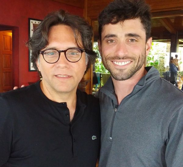 When Ethan Klein showed this photo of Keith Raniere and Marc Elliot during his interview, Klein said, in deadpan, Raniere has 'nice skin."