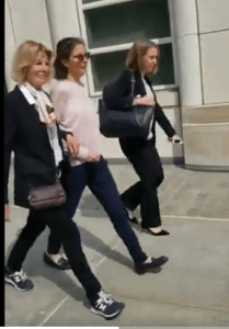 Clare Bronfman [center] with her mother, Georgiana Havers, and attorney, Kathleen E. Cassidy.