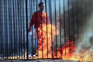 ISIS burns a hostage alive.