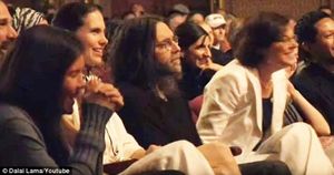 Keith Raniere and Nancy Salzman listen to the Dalai Lama speak in Albany.