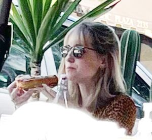Allison Mack enjoys a meal just prior to entering prison.