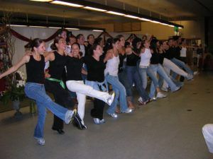 Mexican NXIVM members dance before Keith Raniere