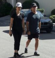 Keith Raniere in Mexico with branded slave Jimena Garza.