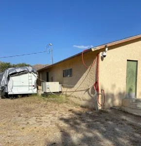 Jorge Avalos lived in the trailer near the gate.