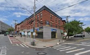 Love's companies own real estate in NYC, including this property at 25 Victory Boulevard, in the heart of Hanks' Staten Island District.