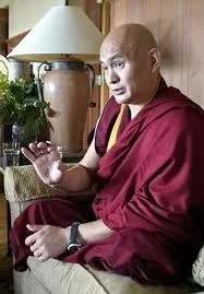 Lama Tenzin pontificating on Buddhist monasticism