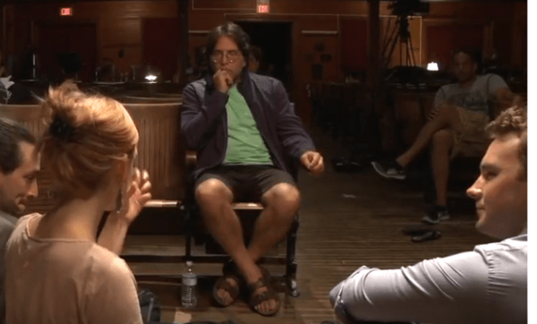 Mark Hildreth [right] sits, along with fellow Nxivm leader Allison Mack, at the feet of the master Keith Alan Raniere.