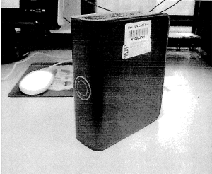 FBI Forensic Examiner Trainee Virginia Donnelly's photograph of the hard drive shows  it was black, not silver.