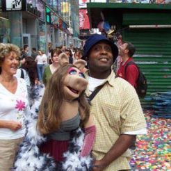 Michael West with a Miss Piggy puppet he designed and created.