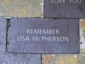 memorial brick says Remember Lisa McPherson