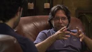 Vanguard, AKA Keith Raniere, speaks with his disciple, Emiliano Salinas.