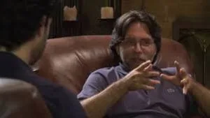 Vanguard, AKA Keith Raniere, speaks with his disciple, Emiliano Salinas.
