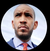 Wayne Collins stayed with Letitia James as she moved from the Public Advocate to Attorney General. He is  Director of Advance at Office of the New York State Attorney General