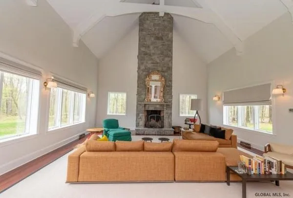 sara bronfman living room two story fireplace