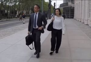 Lauren Salzman leaves court with her Arizona attorney, Hector Diaz.