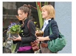 Kristin Kreuk and Allison Mack, when both were in NXIVM. Mack is forbidden to associate with past and present members of NXIVM without her attorneys present, as a condition of her bail. Since her attorneys are in New York City - it effectively bars reunion with most of her old friends, pals, and slaves.