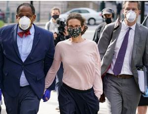 Clare Bronfman heads to court with her attorneys.