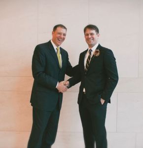 Jim shaking hands with Anthony Ames, a fellow leader of the Society of Protectors.