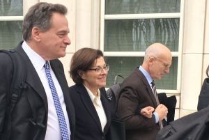 Nancy Salzman, with her lawyers David Stern [l] and Robert Soloway [r].