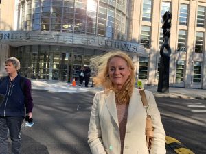 Barbara Bouchey leaving court after the sentencing of Clare Bronfman. Susan Dones is on the left.