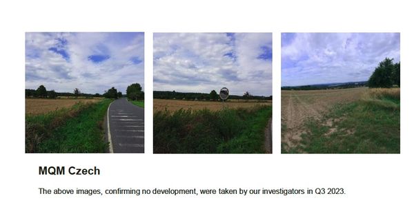 Paved country road through flat fields under a cloudy sky in a rural landscape (Czech countryside). If this is a series, describe the location as along a rural road with open fields and a blue sky.