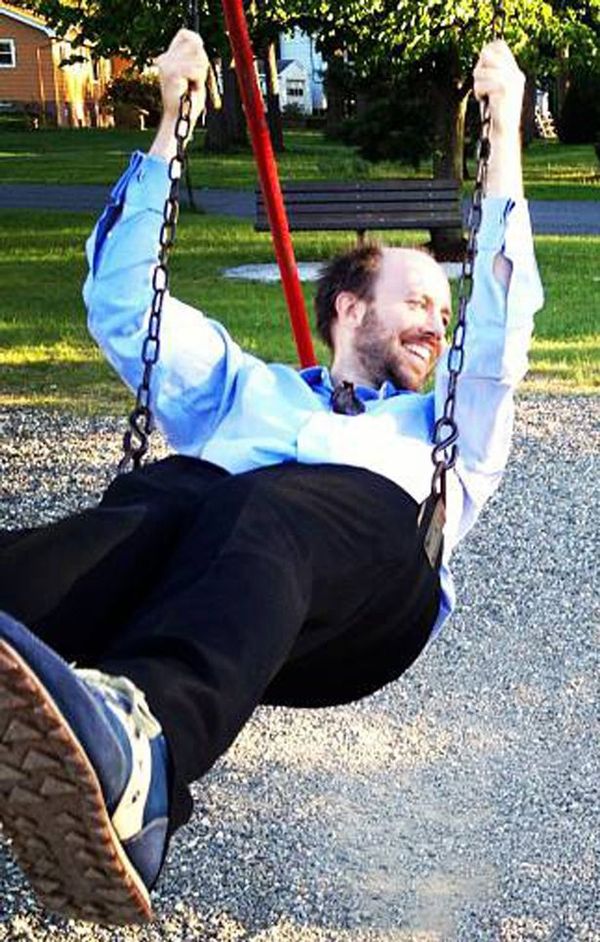 Dr. Brandon Porter takes a moment to relax on a swing in between showing human fright experiments on unsuspecting women.