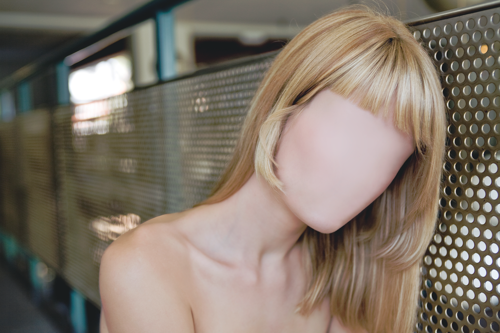 Should harem members be named and their roles with Raniere identified?